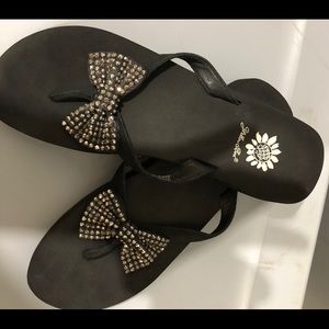 Flip flops with decoration.